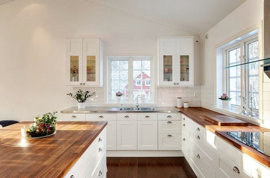 cozy wooden kitchen countertops 12 554x365 Không gian phòng bếp đẹp với nội thất bằng gỗ độc đáo