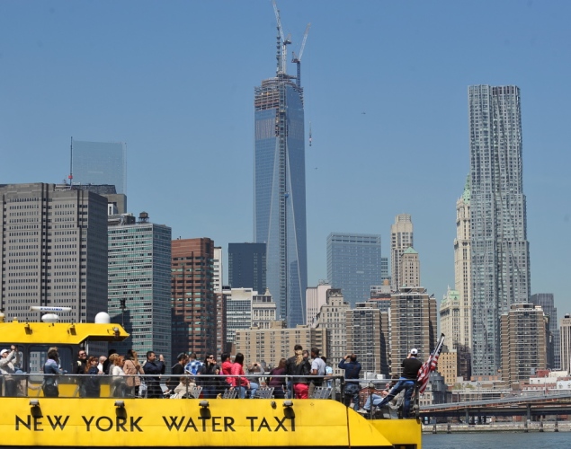 Reaching heights of 1,776 feet, One World Trade has surpassed the Empire State Building to become the tallest building in New York City. Previously dubbed the Freedom Tower, the building proudly stands tall in Lower Manhattan as a reminder of the resilience of New York City after a grave act of terror. The installation of the silver spire topping One World Trade Center was finished n May 10, 2013, bringing the iconic structure to its full, symbolic height of 1,776 feet. The final bolts were installed to secure the spire onto the building at 8 a.m., workers said. Follow One World Trade Center's rise from a devastated Ground Zero to the third tallest building in the world ... world trade center 2013 Tòa nhà cao thứ hai thế giới cất nóc tại New York